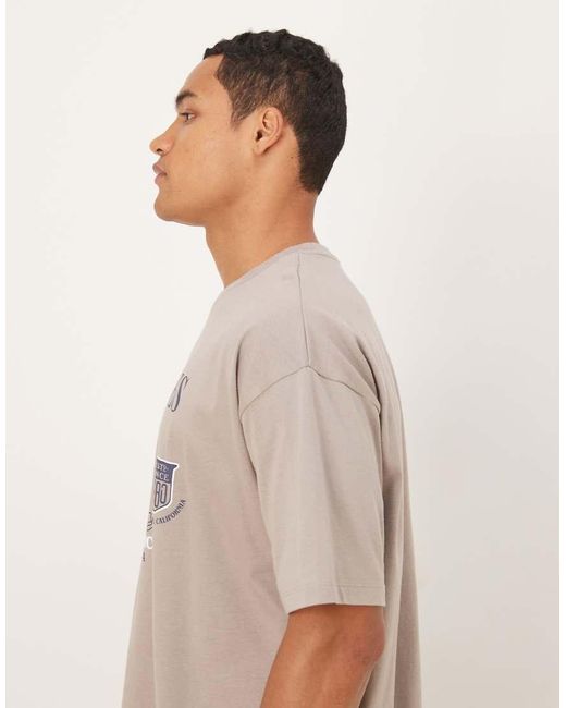 ASOS Natural Oversized T-Shirt With Sports Graphic for men