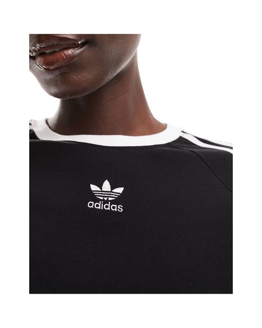 T-shirt crop top à trois bandes Adidas Originals en coloris Black