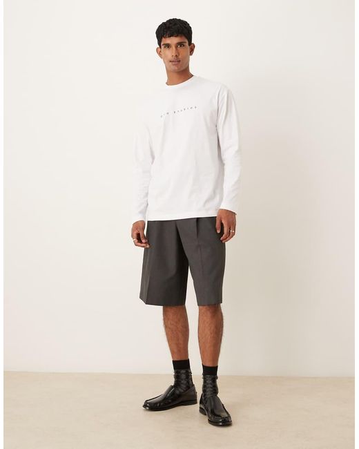 T-Shirt Comoda A Maniche Lunghe Bianca Con Stampa Di Stemma Sul Petto di ASOS in White da Uomo