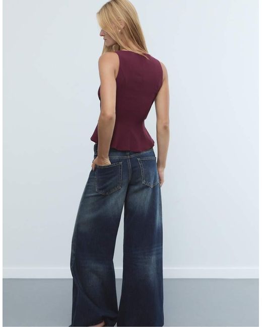 Top Senza Maniche A Peplo di Stradivarius in Purple