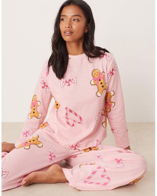 ASOS Pink Asos Design Petite Gingerbread & Candy Cane Long Sleeve Top & Trouser Pyjama Set