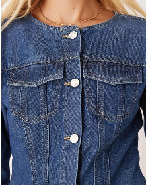 Veste en jean longue sans col avec taille cintrée - moyen ASOS en coloris Blue