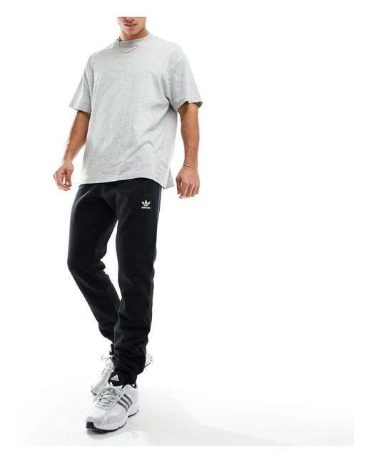 Adidas Originals White Essentials joggers for men