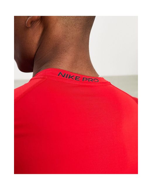 Nike – pro dri-fit – eng geschnittenes, langärmliges oberteil in Red für Herren