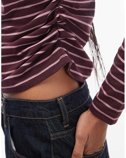 Reclaimed Vintage Purple Slash Neck Cinched Waist Long Sleeve T-shirt With Ruching Detail
