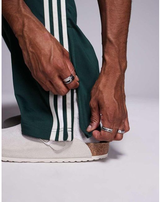 Adidas Originals Green Firebird Track Pants for men