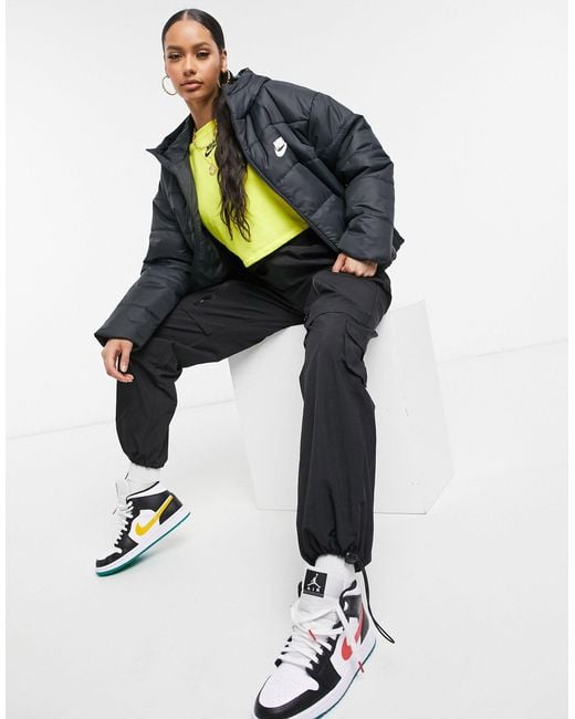 Nike Padded Jacket With Back Swoosh in Black | Lyst Australia