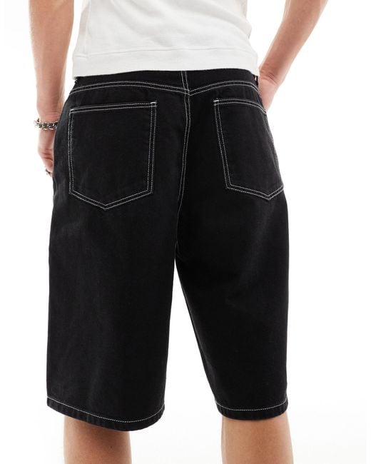 Pantaloncini di jeans neri ampi di Bershka in Black da Uomo
