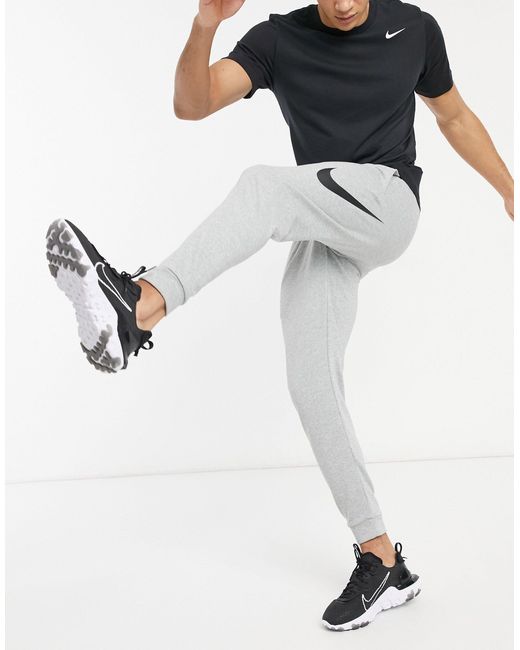 Nike Swoosh joggers in Grey (Grey) for 