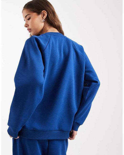 Felpa Sportiva Color Cobalto Con Profili A Contrasto di Collusion in Blue