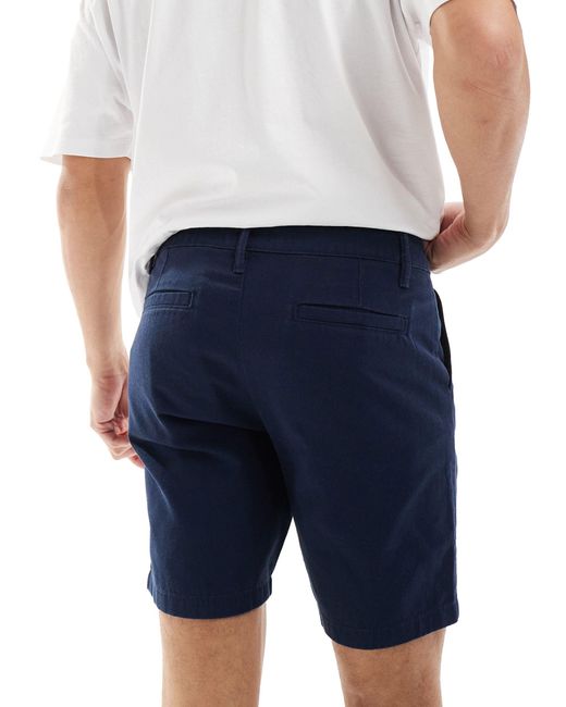 Confezione da 2 pantaloncini chino elasticizzati slim blu navy e color pietra di ASOS in White da Uomo