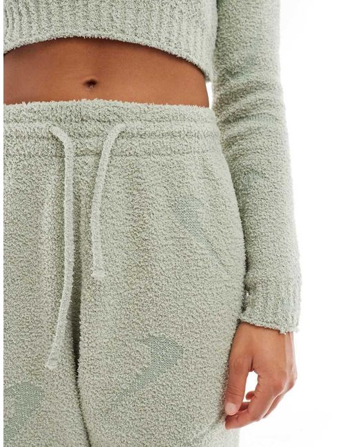 Nike Green Phoenix Boucle All Over Print Swoosh High-waisted joggers