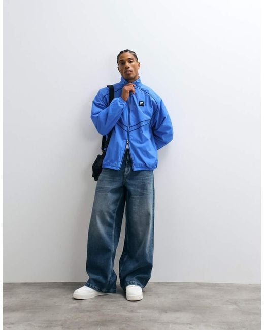 Nike Blue Air Funnel Neck Windrunner Track Jacket for men