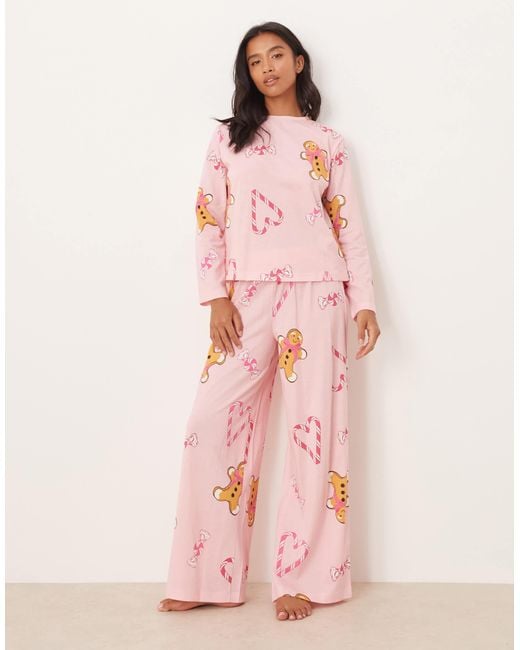 ASOS Pink Asos Design Petite Gingerbread & Candy Cane Long Sleeve Top & Trouser Pyjama Set
