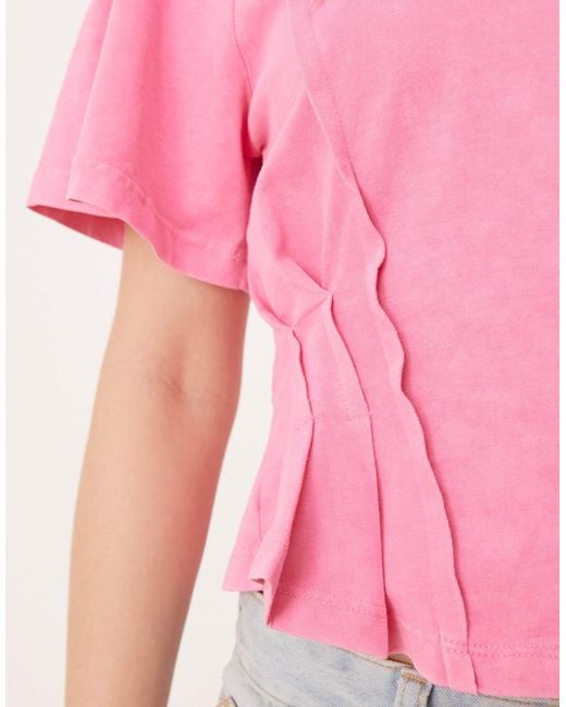T-shirt à manches courtes et surpiqûres avec taille corsetée - délavé ASOS en coloris Pink