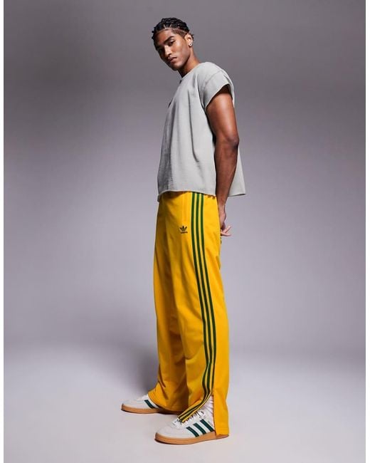 Adidas Originals Yellow Firebird Track Pants for men