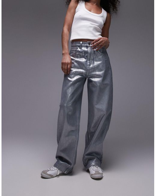 Jeans ampi a vita alta colomba laminati argento di TOPSHOP in Gray