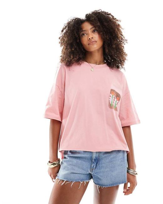 T-Shirt Oversize Crepuscolare Con Grafica A Riquadri Con Fiori di ASOS in Pink