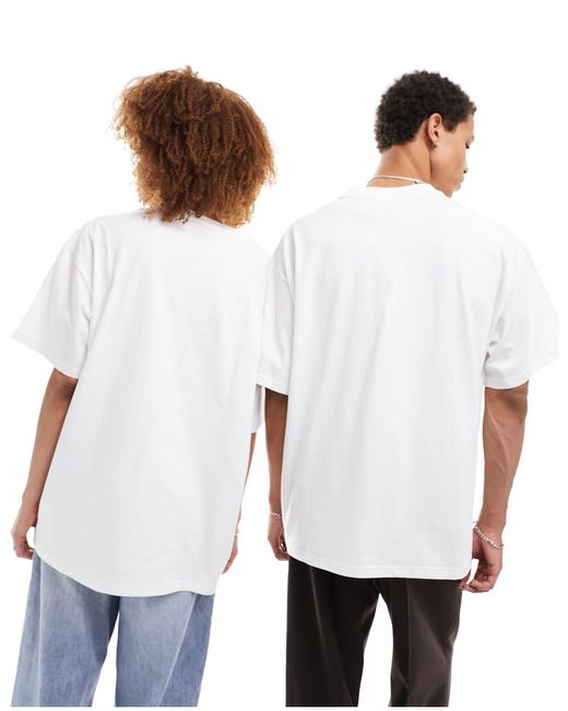 T-shirt bianca con logo del fiore star chevron di Converse in White