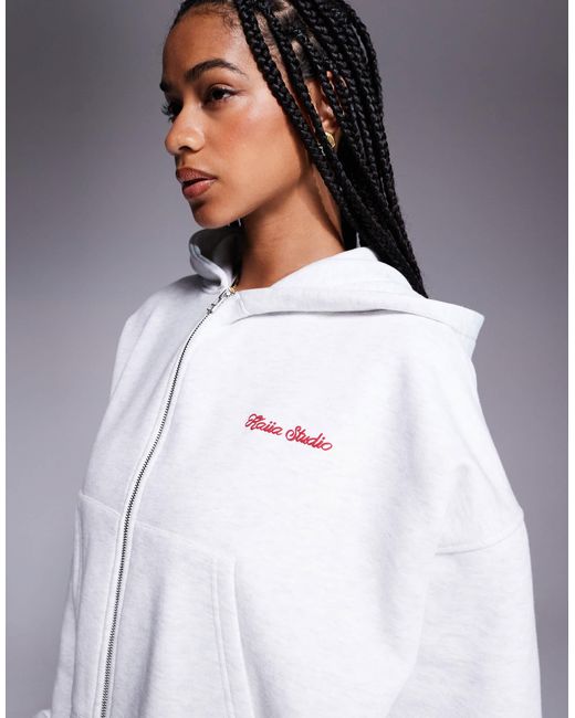 Studio - sweat à capuche zippé court d'ensemble en coton majoritaire à imprimé cerise au dos - chiné et rouge Kaiia en coloris Gray