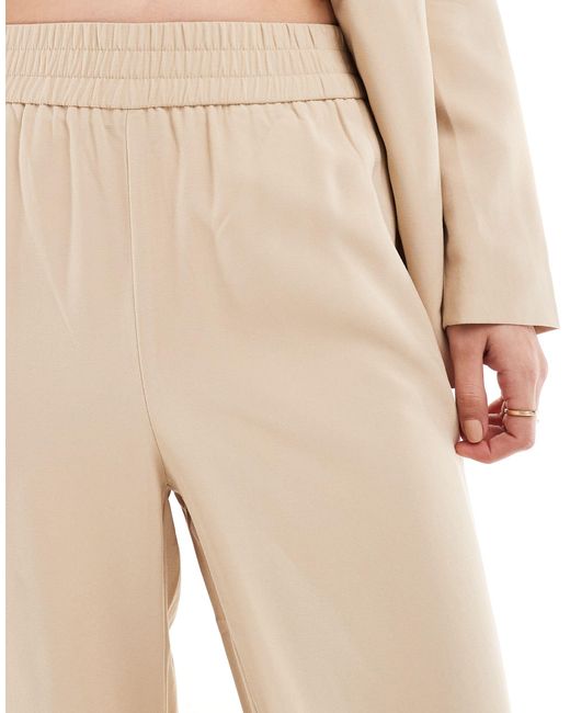 Mix and match - pantaloni a fondo ampio sartoriali crema di Vero Moda in Natural