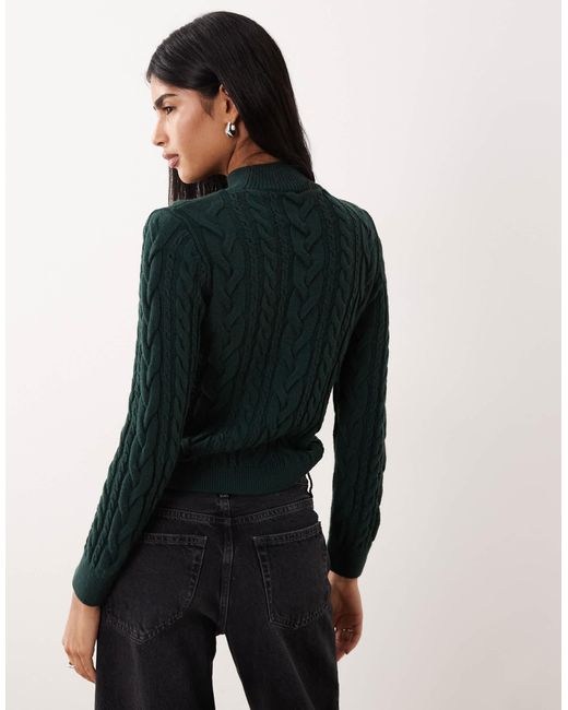 Pull à col montant en maille torsadée - foncé Mango en coloris Green