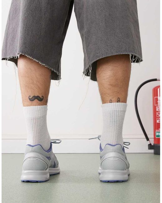 Asics Jog 100S in het Gray voor heren
