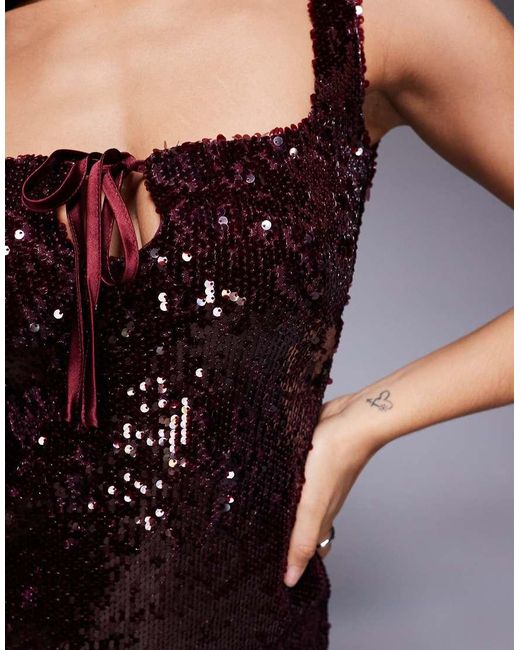 The Frolic Black Exclusive Sequin Square Neck Tie Front Mini Dress