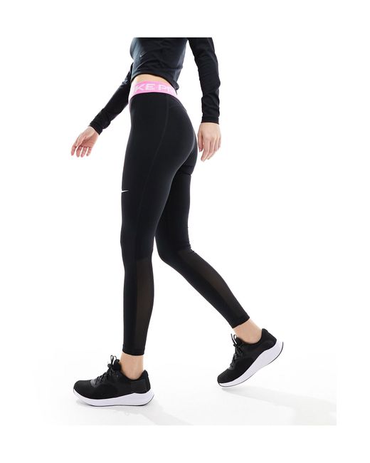 Nike - pro training 365 - legging à taille mi-haute - et rose Nike en coloris Black