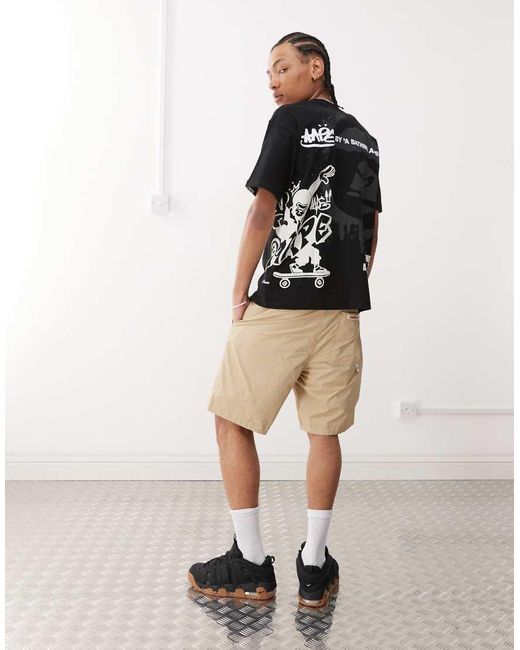Camiseta Negra De Corte Cuadrado Con Estampado Posicional De Monopatín Y Logo De Aape By A Bathing Ape de hombre de color Black