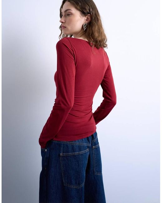 TOPSHOP Red Modal Ruched Slash Neck Long Sleeve Top