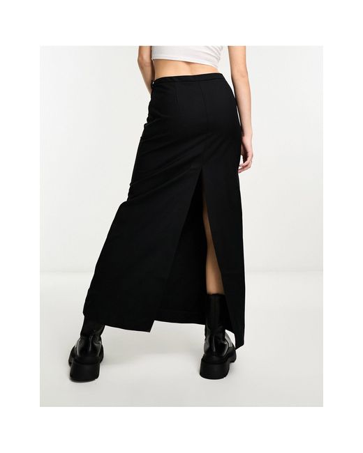 Grace - jupe longue fendue à l'arrière Weekday en coloris Black