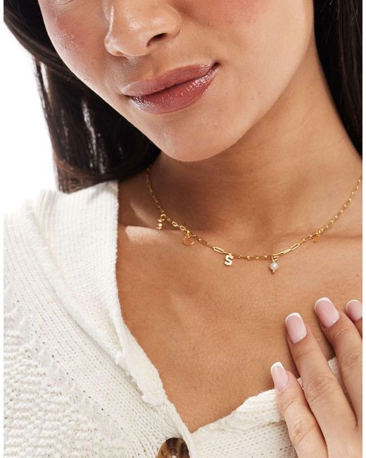 Z collection - collier en plaqué or avec breloques célestes et initiale « s » Accessorize en coloris Natural