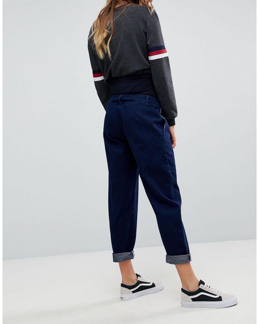 tapered jeans with curved seams