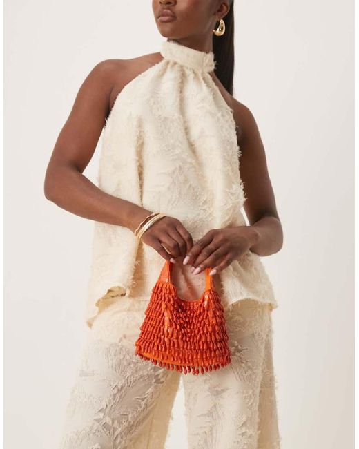 Borsa A Mano Con Perle A Goccia di ASOS in Orange