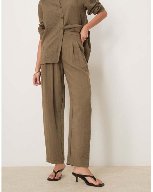 Pantalones Caquis De Corte Tapered Con Detalle De Trabilla En La Cintura De -Verde ASOS de color Natural