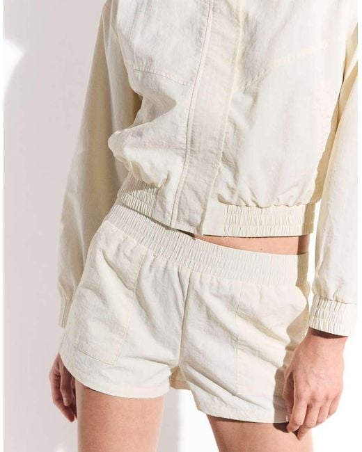 The Frolic White Exclusive Nylon Track Shorts Co-ord