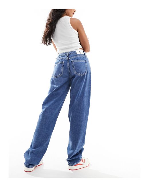 Jeans dritti stile anni '90 lavaggio medio di Calvin Klein in Blue