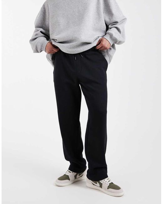 Joggers Negros Básicos De Pernera Recta De ASOS de hombre de color White