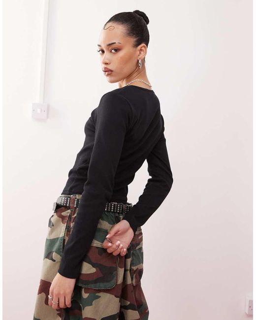 Top A Maniche Lunghe A Coste Con Scollo Squadrato di Collusion in Black