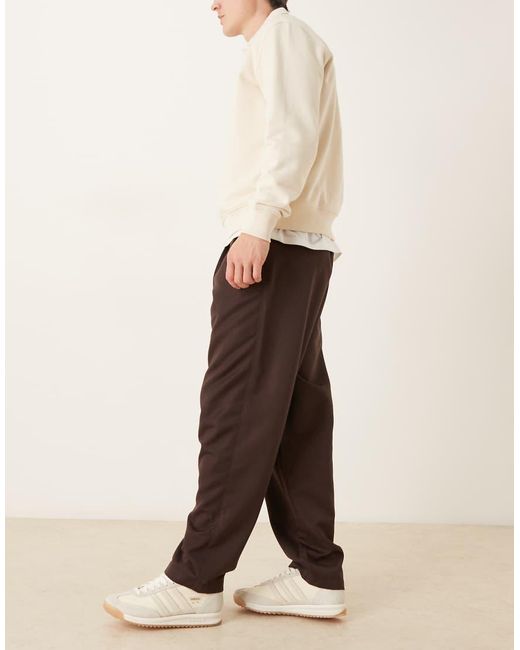 ASOS Brown Oversized Tapered Fit Trousers With Pleat Detail for men