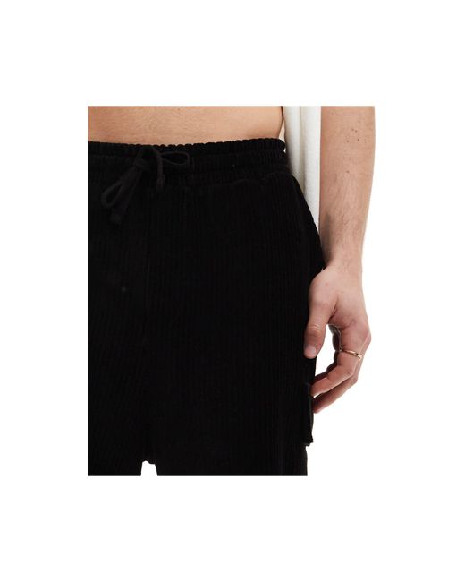 ASOS – oversize-shorts aus geripptem velours in Black für Herren