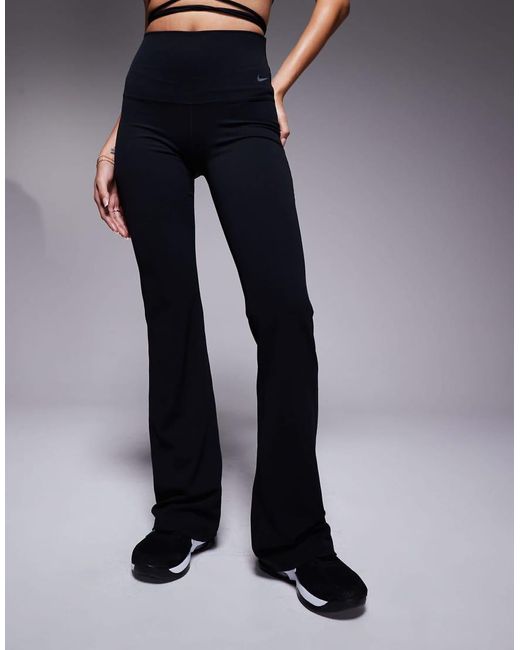 Pantalones De Campana Negros De Talle Alto De Tejido Suave Dri-Fit Zenvy De Nike de color Blue