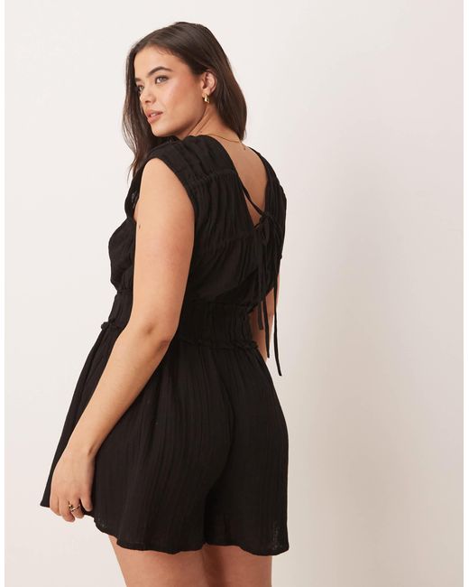 Asos design curve - combishort double épaisseur avec bustier froncé ASOS en coloris Black