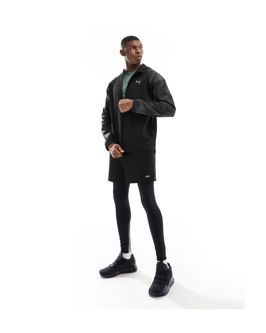 Running favourite - giacca nera di PUMA in Black da Uomo