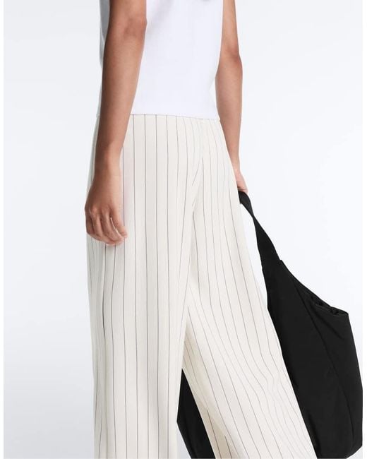 Oysho White Soft-touch Pinstripe Wide-leg Trousers With Modal