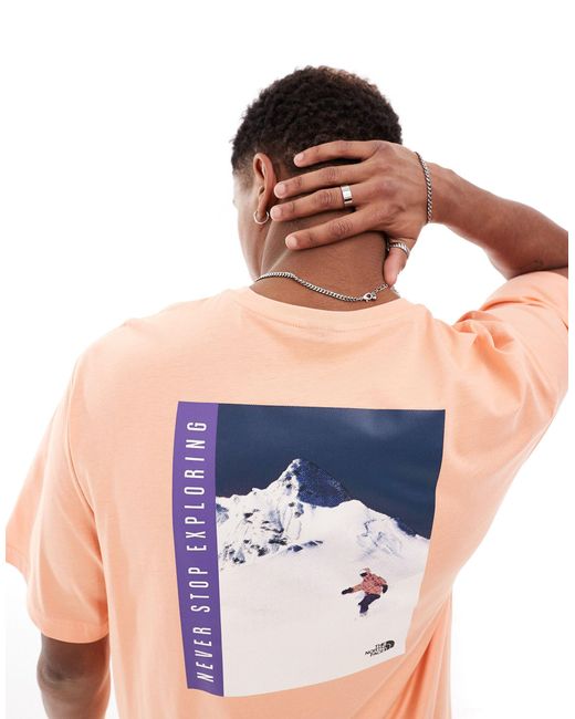The North Face Orange Snowboard Retro Back Graphic T-shirt for men