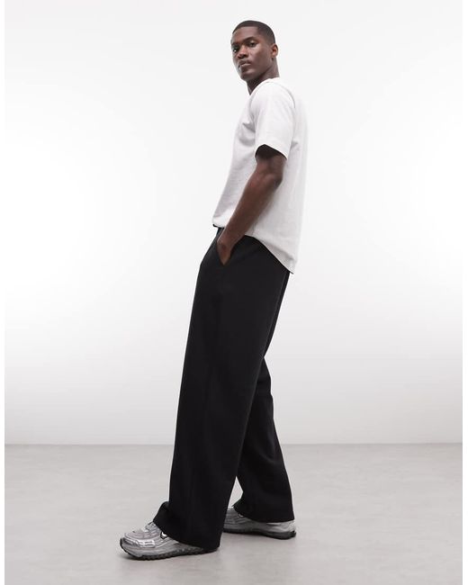 Collusion White Relaxed Sweatpants for men