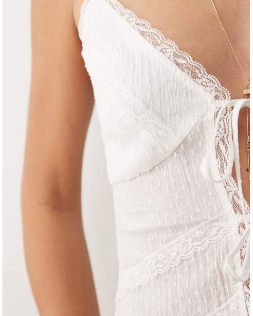 The Frolic White Exclusive Dobby Cotton Lace Trim Tie Front Cami Top