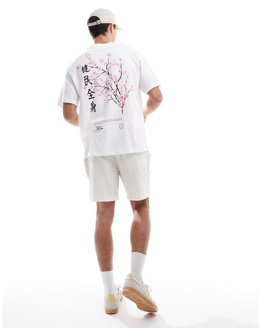T-Shirt Oversize Bianca Con Stampa Di Fiori E Scritta di Jack & Jones in White da Uomo